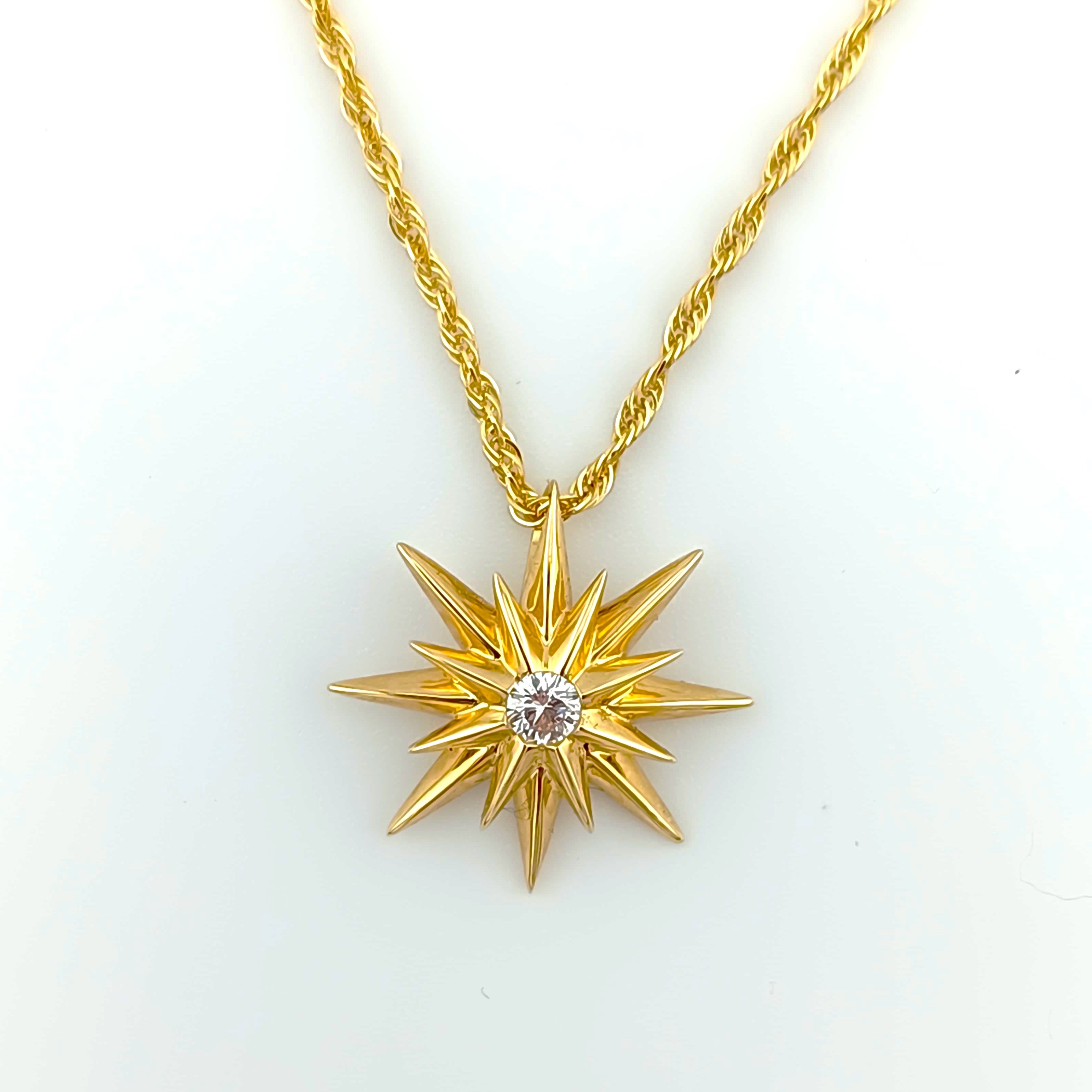 Celestial Brilliance – 16-Point Star Diamond Pendant in Solid 14K Gold