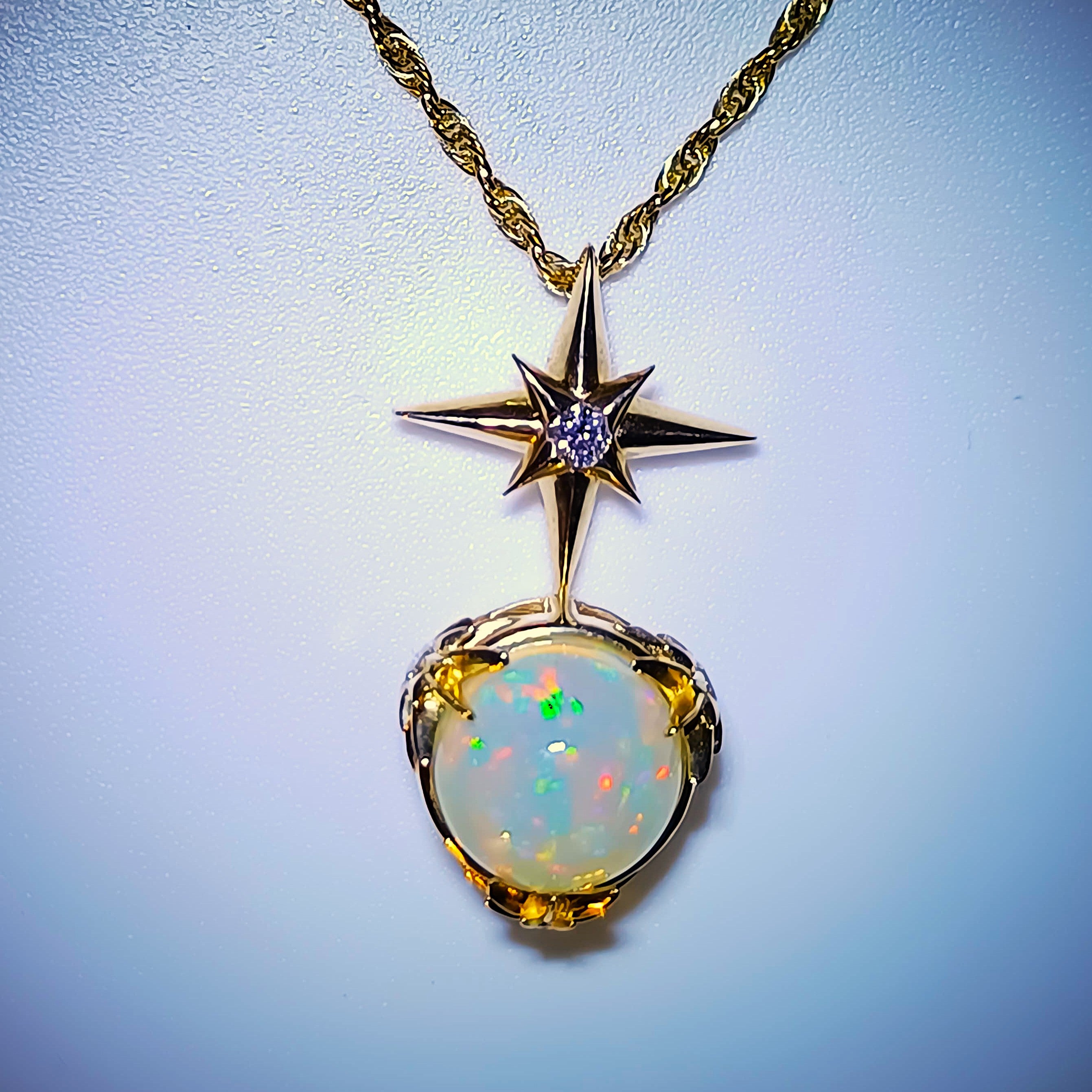 Aurora Starfire – White Fire Opal & Diamond Pendant in Solid 14K Gold